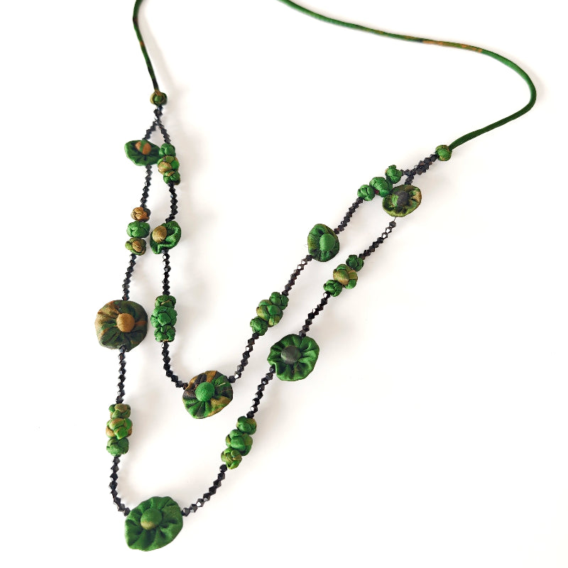 Xiangyunsha fabric bead layered necklace in dark plum styled on mannequin